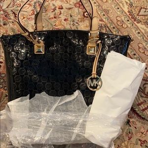 MIchael Kora multifunction bag